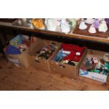 Four boxes of assorted toys including Paddington and soft toys, Star Wars comics, carousel,