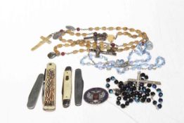 Austrian Maria Thaler silver enamel coin brooch, pen knives and rosary beads.