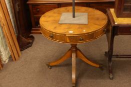 Yew three drawer pedestal drum table.