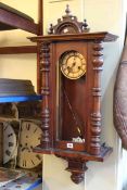 Victorian walnut cased Vienna style wall clock.