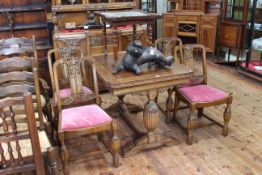 1920's/30's six piece carved oak dining suite comprising shaped front sideboard,
