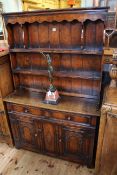 Good carved oak dresser and rack, 166cm high by 107cm wide by 33cm deep.