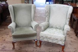 Two similar wing armchairs, one Parker Knoll.
