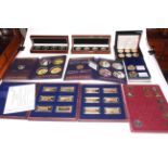 Collection of gold plated coins including The First Word War Centenary Crown Collection in box with