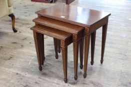 Alan 'Acornman' Grainger mahogany and line inlaid nest of three tables (largest 53cm high by 58cm