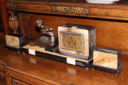 Three piece slate and onyx Art Deco mantel clock depicting girl with bird.