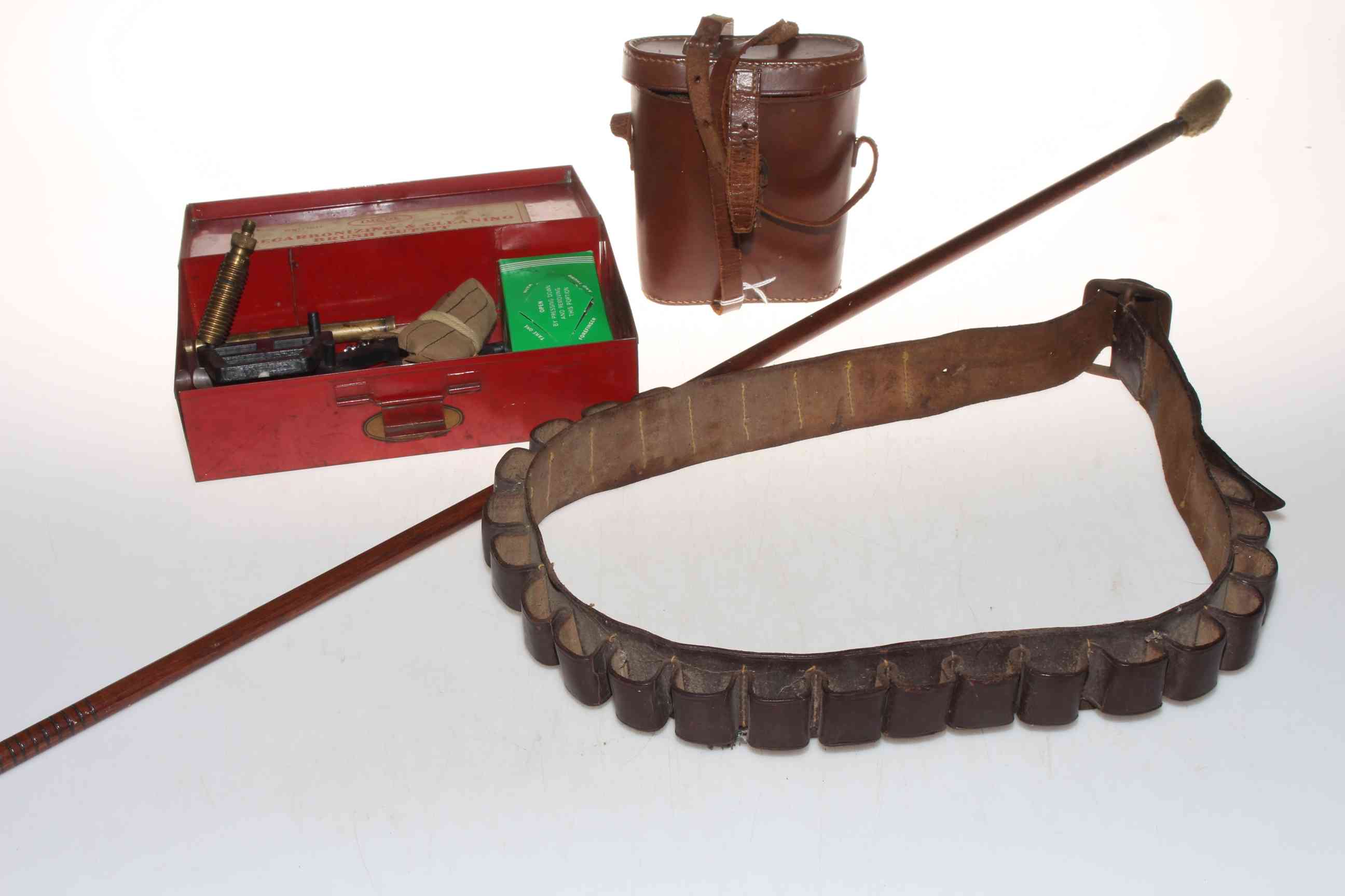 Taylor Hobson London hunting binoculars, cartridge belt and gun cleaning equipment.