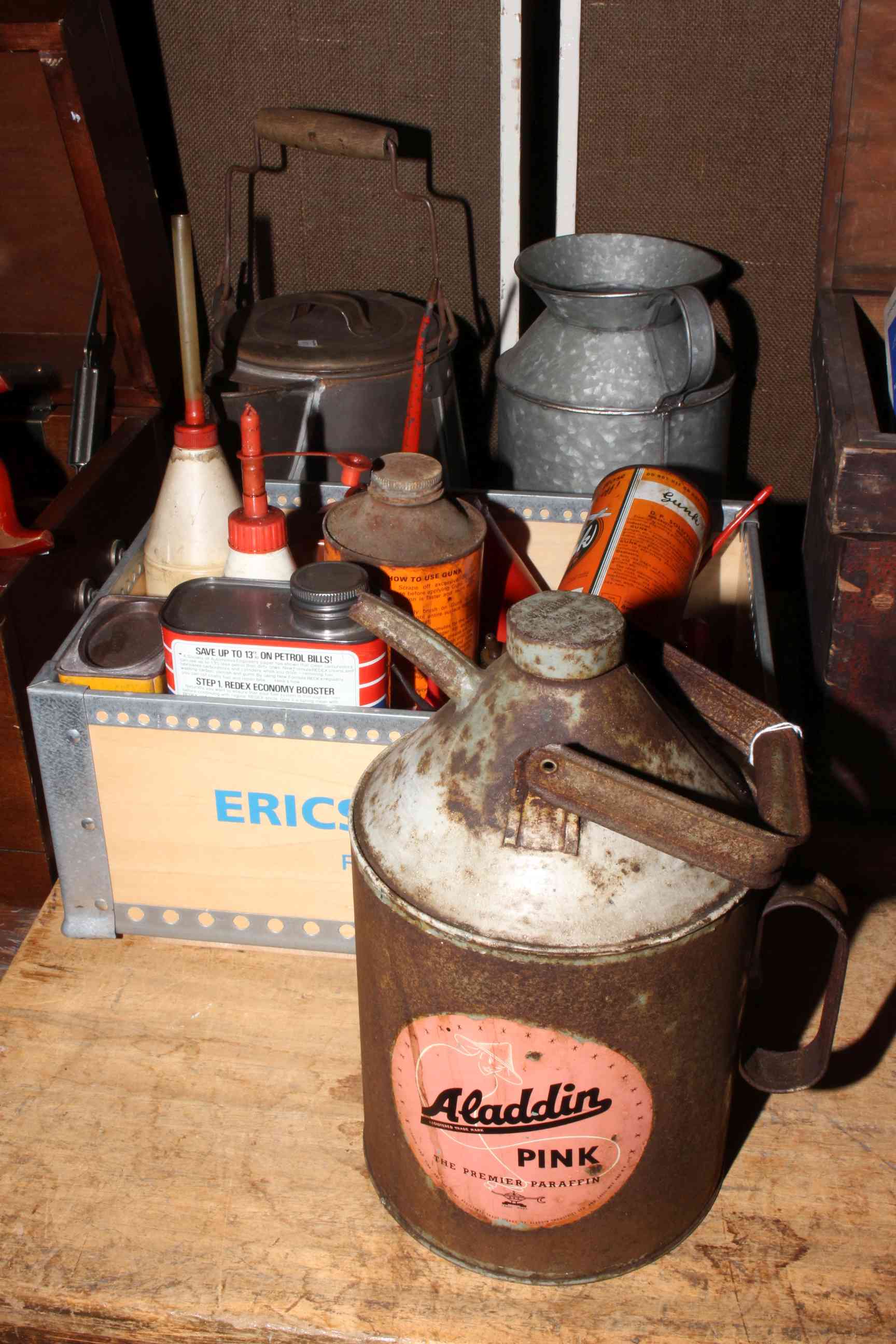 Collection of vintage and later oil cans.