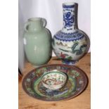 Chinese dragon bowl, large charger, two Oriental vases, tallest 45cm.