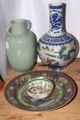 Chinese dragon bowl, large charger, two Oriental vases, tallest 45cm.