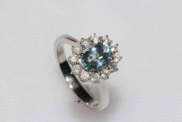 18 carat whit gold aquamarine and diamond cluster ring having approximately 1.