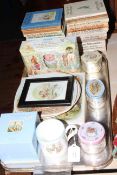 Collection of Beatrix Potter china and books.