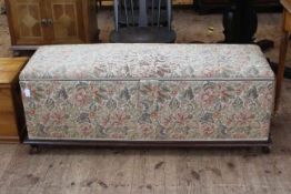 Late 19th Century ottoman in floral tapestry fabric, 50cm high by 138cm wide by 49cm deep.