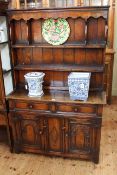 Good carved oak dresser and rack, 166cm high by 107cm wide by 33cm deep.