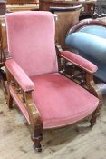 Victorian mahogany framed armchair on turned legs.