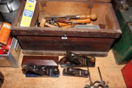 Tool box containing wood planes, sharpeners and other tools (box 30cm by 62cm by 28cm).
