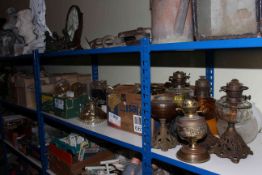 Large collection of oil lamps, shades, chimneys, hanging lamps, etc.