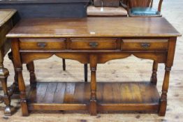 The Royal Oak Furniture Company three drawer potboard dresser, 77cm high by 129cm wide by 46cm deep.