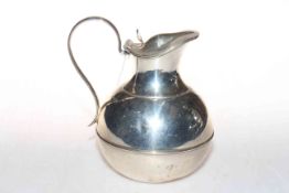 Silver ewer with ribbed spherical body, Sheffield 1912, 18cm.