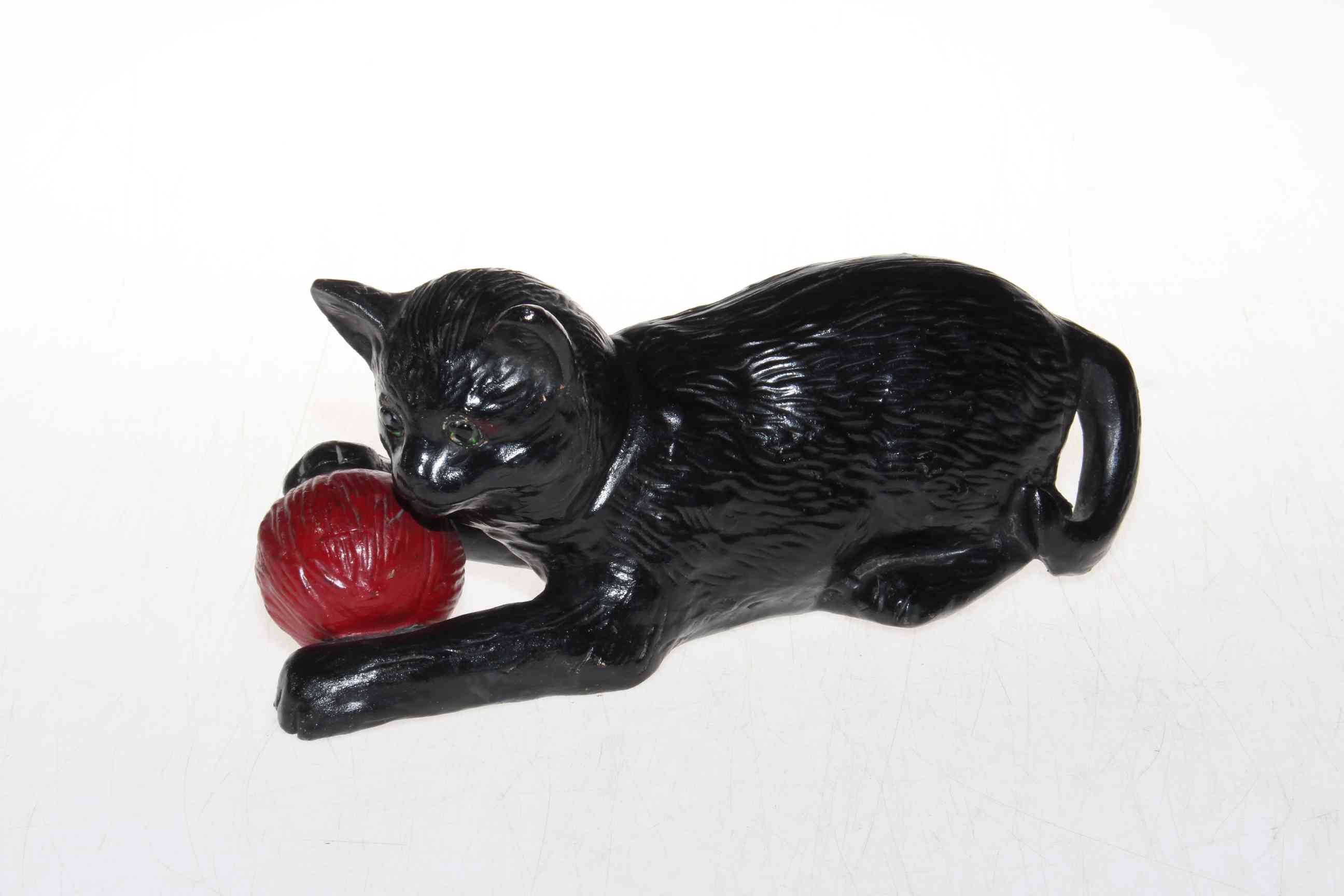 Bretby black cat with ball.