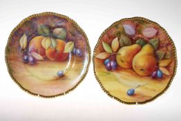 Two hand painted Coalport plates by Anthony Baggott and Norman Lear.