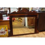 Late Victorian mahogany overmantel bevelled mirror, 124cm by 151cm.