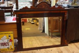 Late Victorian mahogany overmantel bevelled mirror, 124cm by 151cm.