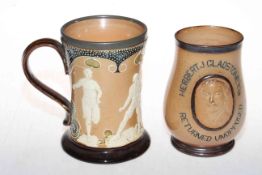 Doulton Lambeth stoneware 'sporting' mug with relief decoration, 15cm,
