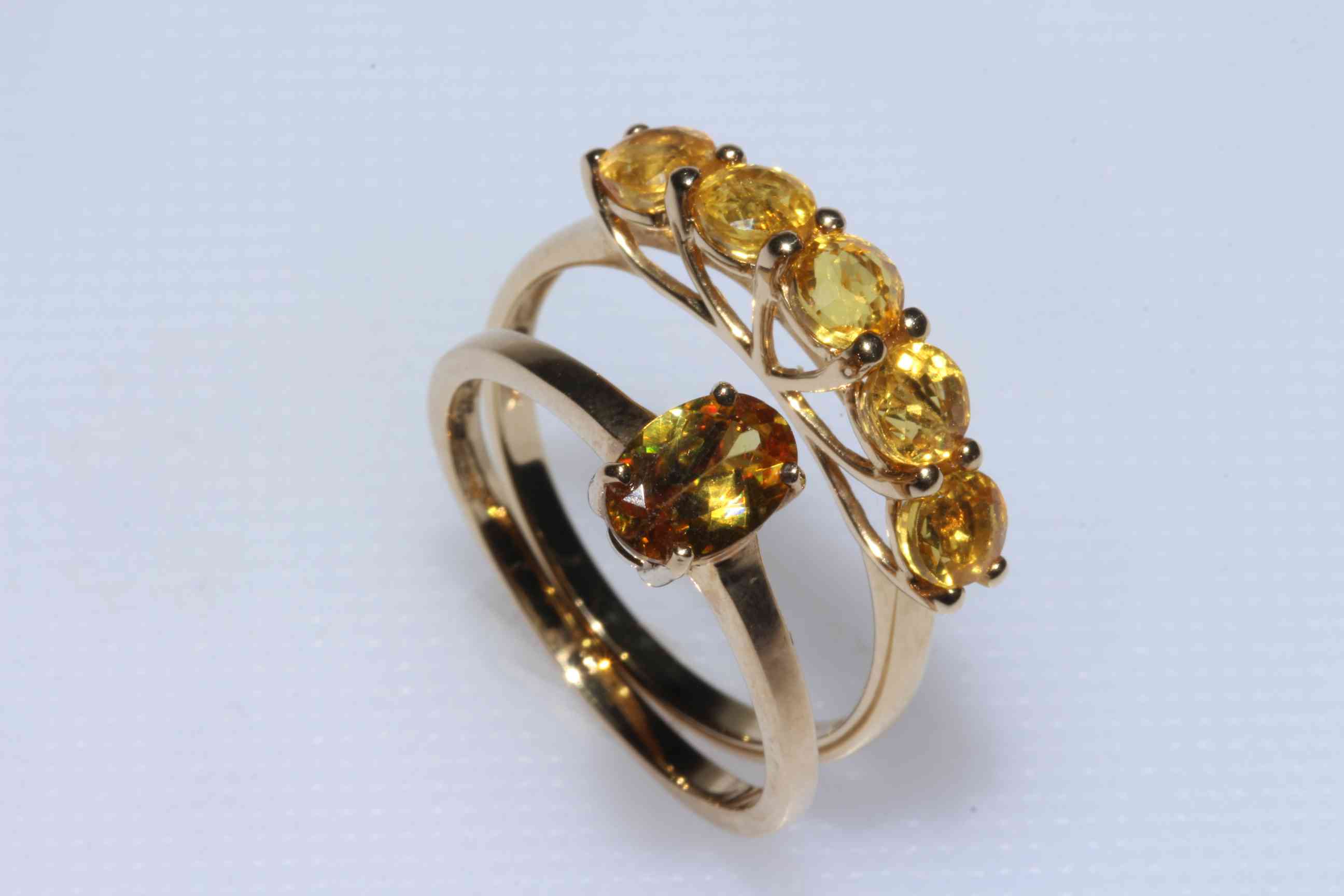 Two 9k yellow sapphire rings.