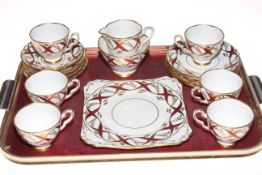 Twenty one piece Royal Staffordshire tea service with red and gilt design.