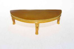 Chinese yellow glazed demi-lune table stand, 25cm across, 7.5cm high.