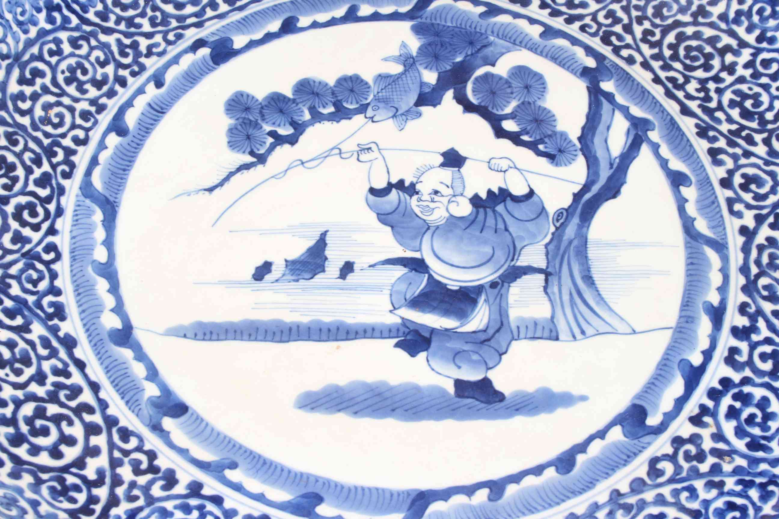 Large circular Chinese blue and white charger decorated with fisherman in landscape and symmetrical - Image 2 of 3