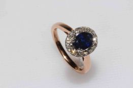 Sapphire and diamond cluster 18 carat gold ring having approximately 1.