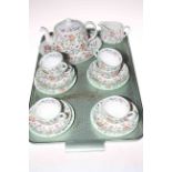 Twenty one pieces of Minton Haddon Hall teaware.