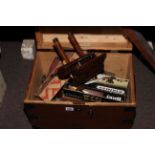 Box containing wood planes, spoke shaves, chisels, etc (box 28cm by 45cm by 30cm).