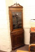 Edwardian mahogany and line inlaid astragal glazed door top standing corner cabinet.