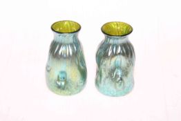 Pair of iridescent art glass vases, 9cm high.