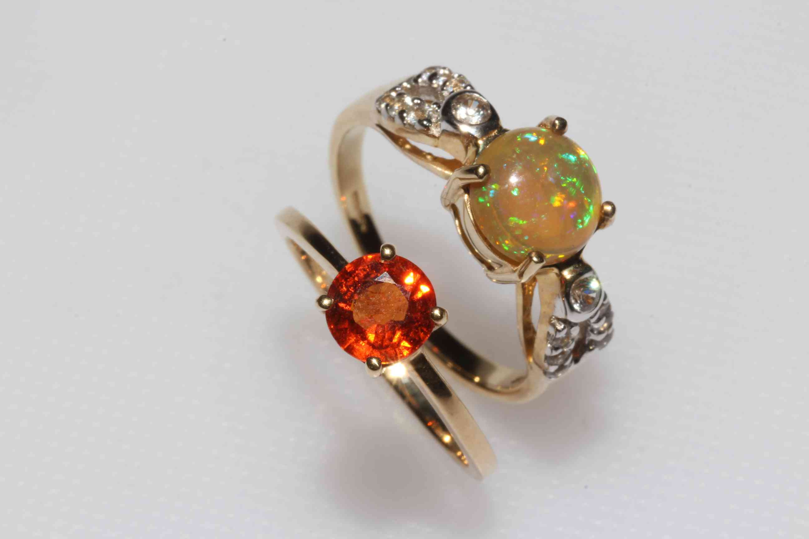 Opal and white sapphire 9k gold ring size N, and red andesine 9k gold ring, size P/Q (2),