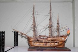 Carved wood galleon depicting HMS Endeavour, 85cm length.