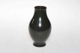 Chinese dark green glazed vase with impressed seal mark, 15cm.