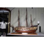 Carved wood galleon depicting Nuestra Senora, 110cm length.