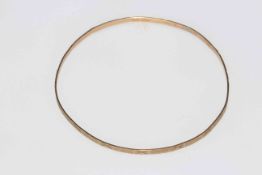 Italian 9 carat gold thin bangle, 6.5cm diameter.