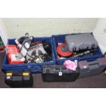 Collection of power tools including saws, drills, sanders, etc.