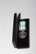 An original EIIR Falklands War South Atlantic campaign medal with rosette awarded to S (M) C. I.