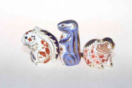 Three Royal Crown Derby paperweights including squirrel, chipmunk and beaver.