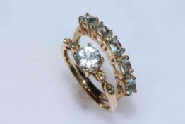 Aquamarine five stone 9k gold ring, size N/O, and 9k zircon ring, size P/Q (2).