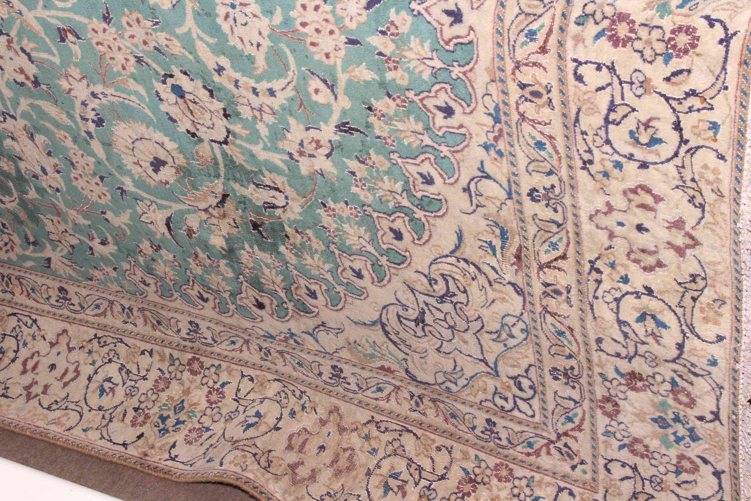Fine hand made green ground Iranian carpet from the Naeen region 325 by 220cm. - Image 2 of 2