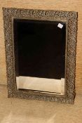 Pierced brass framed bevelled easel mirror.