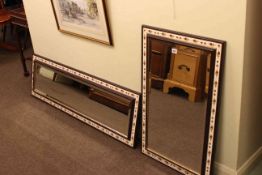 Two mahogany framed bevelled wall mirrors, the frames inset with Royal Albert Country Roses tiles.