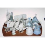 Collection of fourteen Lladro pieces including six bells, butterfly, swans and name plaques.